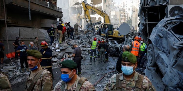 At least 11 killed after Israeli strike flattens building in central Beirut, Civil Defense says